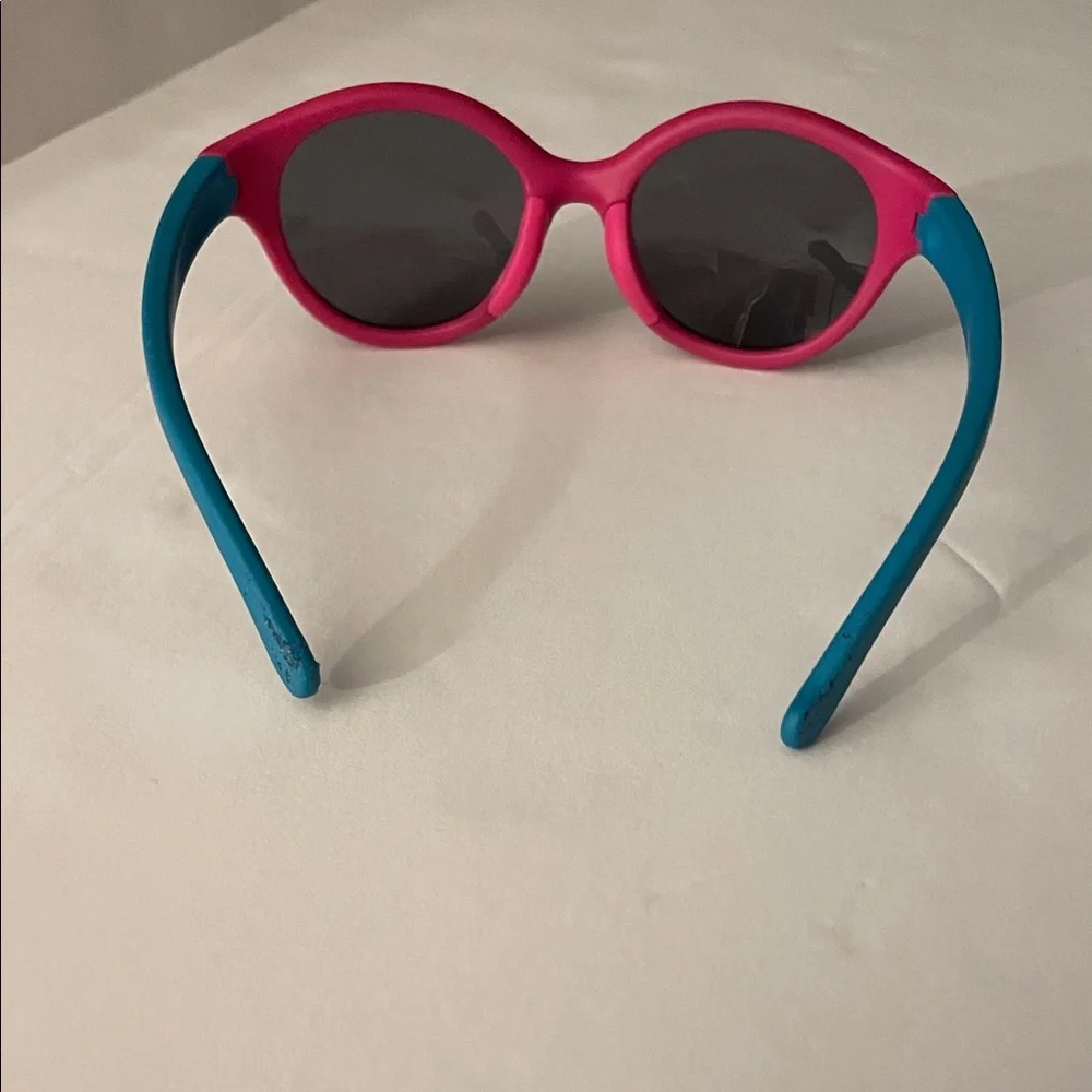 Speedo Vibrant Pink and Blue Sunglasses. Polarized lens, floating frame, age 3